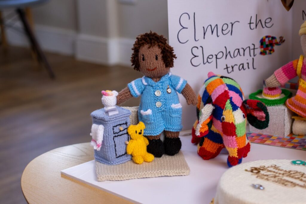 Knitted nurse doll